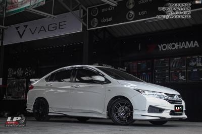 รถ - HONDA CITY ล้อแม็ก -TORQ TAR BY LENSO ดำด้านหน้าชา สเปค - 15x7 ET35 4x100 ยาง -YOKOHAMA A-DRIVE AA01 เบอร์ - 195/55-15