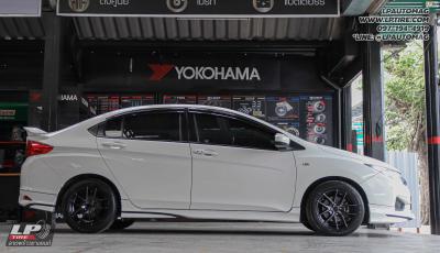 รถ - HONDA CITY ล้อแม็ก -TORQ TAR BY LENSO ดำด้านหน้าชา สเปค - 15x7 ET35 4x100 ยาง -YOKOHAMA A-DRIVE AA01 เบอร์ - 195/55-15