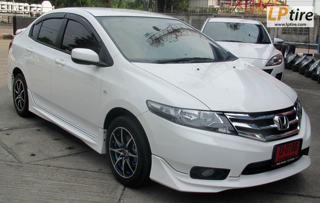 Honda City + ล้อแม็ก YACHIYODA LW-01 15นิ้ว สีดำหน้าเงาขลิบฟ้า + ยาง FALKEN ZE912 195/55-15