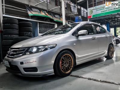 HONDA CITY + ล้อแม็กลาย RE30 15นิ้ว สีน้ำตาลไหม้ + ยางรถยนต์ DUNLOP DZ102 195/50-15