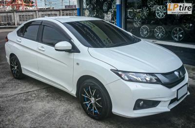 HONDA CITY + แม็กลาย TCK 50185G ขอบ 15นิ้ว สีดำหน้าเงาอันเดอร์คัตฟ้า + ยางรถยนต์ YOKOHAMA AE50 195/55-15