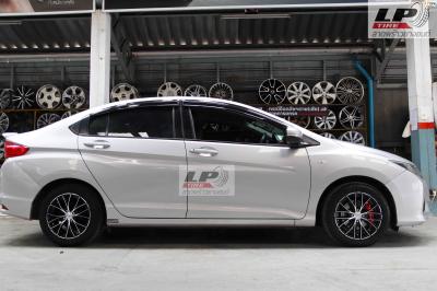 รถ - HONDA  CITY  ล้อแม็ก - MGW  MF-1028 สีดำหน้าเงา สเปค - 15x7.0 4x100 ET35 รัดยาง - HANKOOK  K120 V12 EVO2 เบอร์ - 195/55R15