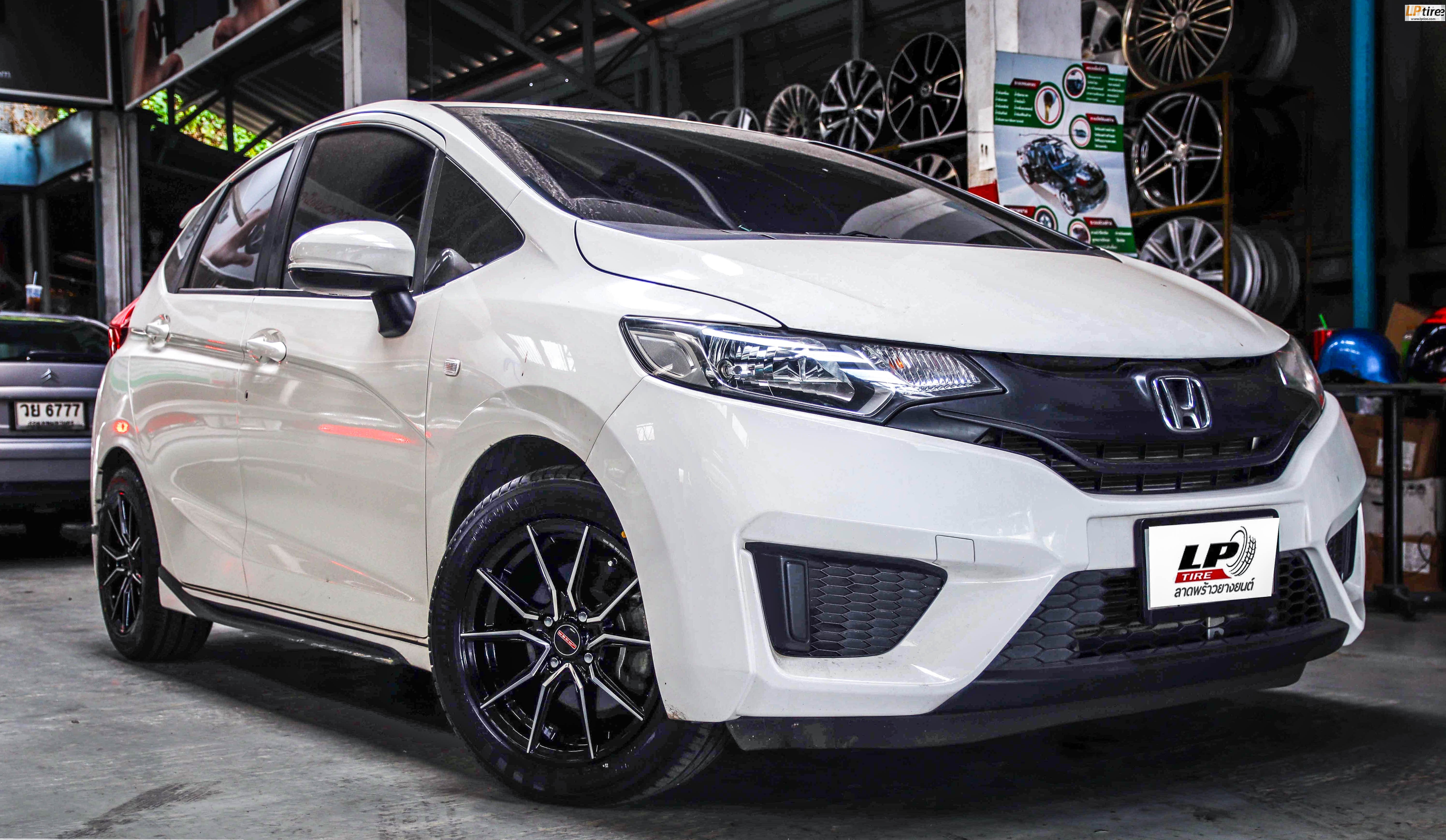 #HONDA#JAZZ จัดล้อแม็ก #LENSO JAGER #JAVA 15x7 ET35 4x100 #ดำหน้าเงา พร้อมยางยนต์ YOKOHAMA A-DRIVE AA01 195/55-15 