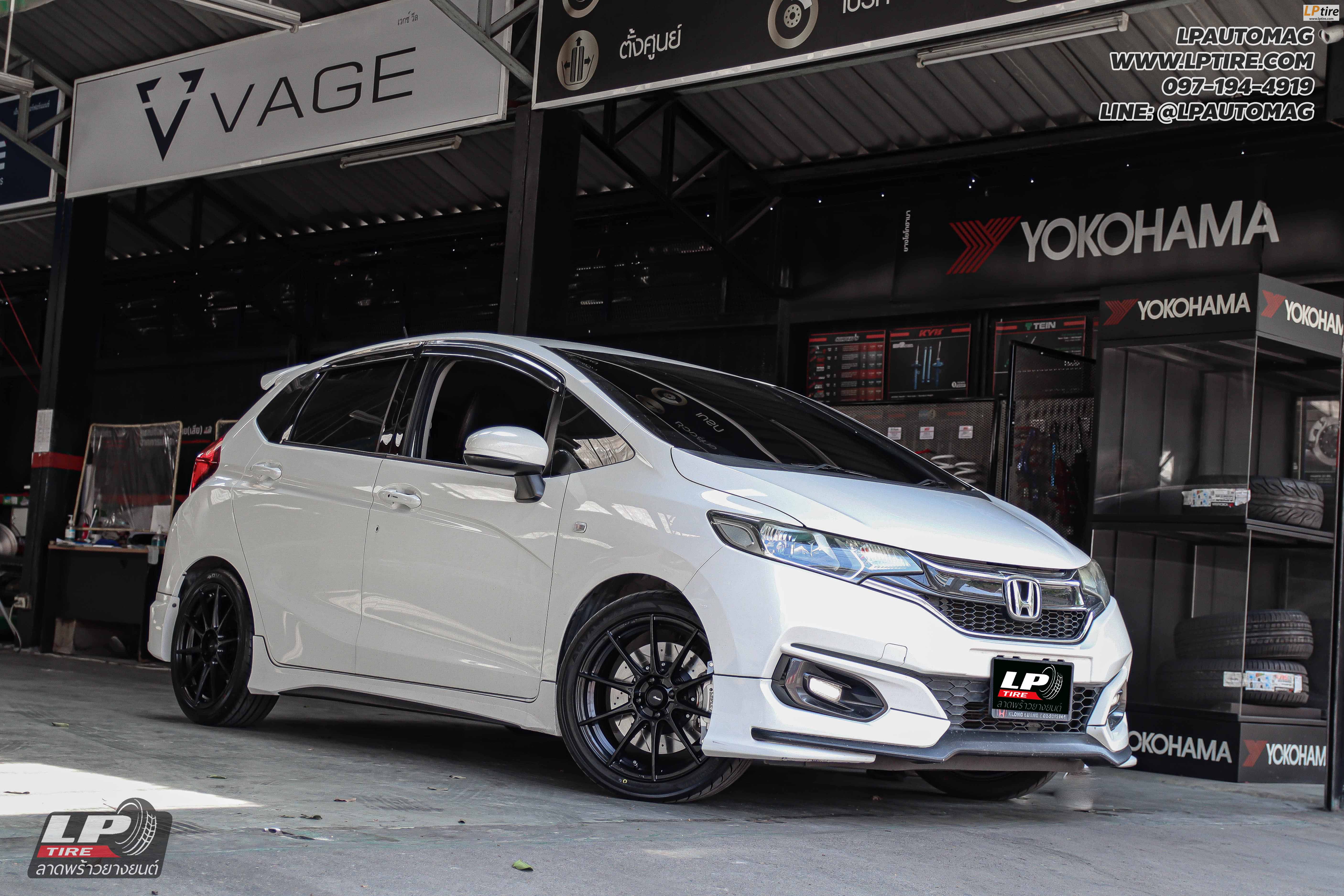 รถ -HONDA JAZZ ล้อแม็ก - ADVANTI N719 FlowForming ดำด้าน สเปค - 17x7 ET40 4x100 ยาง - YOKOHAMA V701 เบอร์ - 205/45-17 ผ้าเบรคหน้า - NEXZTER MU SPEC จานเบรคหน้า RUNSTOP ขยายหน้า SIZE 320 MM น็อตล้อ 7 เหลี่ยม 12x1.5 (ดำ)