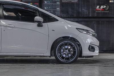 รถ - HONDA JAZZ ล้อแม็ก - TORQ TAR ดำด้านหน้าชา ขอบ -15x7 ET35 4x100 ยาง- YOKOHAMA A-DRIVE AA01 เบอร์ 195/55-15