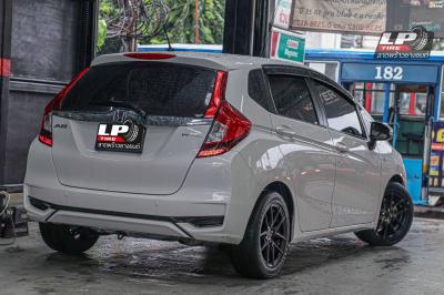 รถ - HONDA JAZZ ล้อแม็ก - TORQ TAR ดำด้านหน้าชา ขอบ -15x7 ET35 4x100 ยาง- YOKOHAMA A-DRIVE AA01 เบอร์ 195/55-15