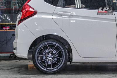 รถ - HONDA JAZZ ล้อแม็ก - TORQ TAR ดำด้านหน้าชา ขอบ -15x7 ET35 4x100 ยาง- YOKOHAMA A-DRIVE AA01 เบอร์ 195/55-15