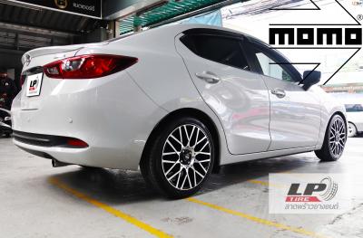 MAZDA 2 เสริมหล่อจัดล้อแม็ก MOMO H486T REVENGE 17x7 ET40 4x100 ดำหน้าเงา