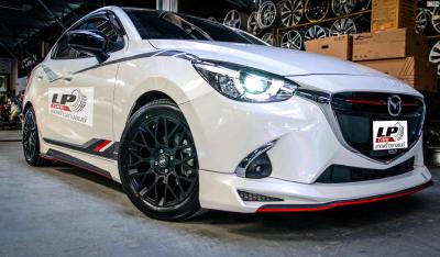 รถ - MAZDA 2 DJ ล้อแม็ก - MOMO REVENGE สี ดำด้าน สเปค - 16x7.0 4x100 ET38 รัดยาง - YOKOHAMA BluEarth-GT AE51 เบอร์ - 195/55R16