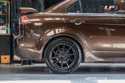 รถ - Mitsubishi Lancer EX ล้อแม็ก - ENKEI SC50 ดำด้าน ขอบ -17x7.5 ET35 5x114.3 ยาง - BRIDGESTONE RE004 เบอร์ -215/50-17