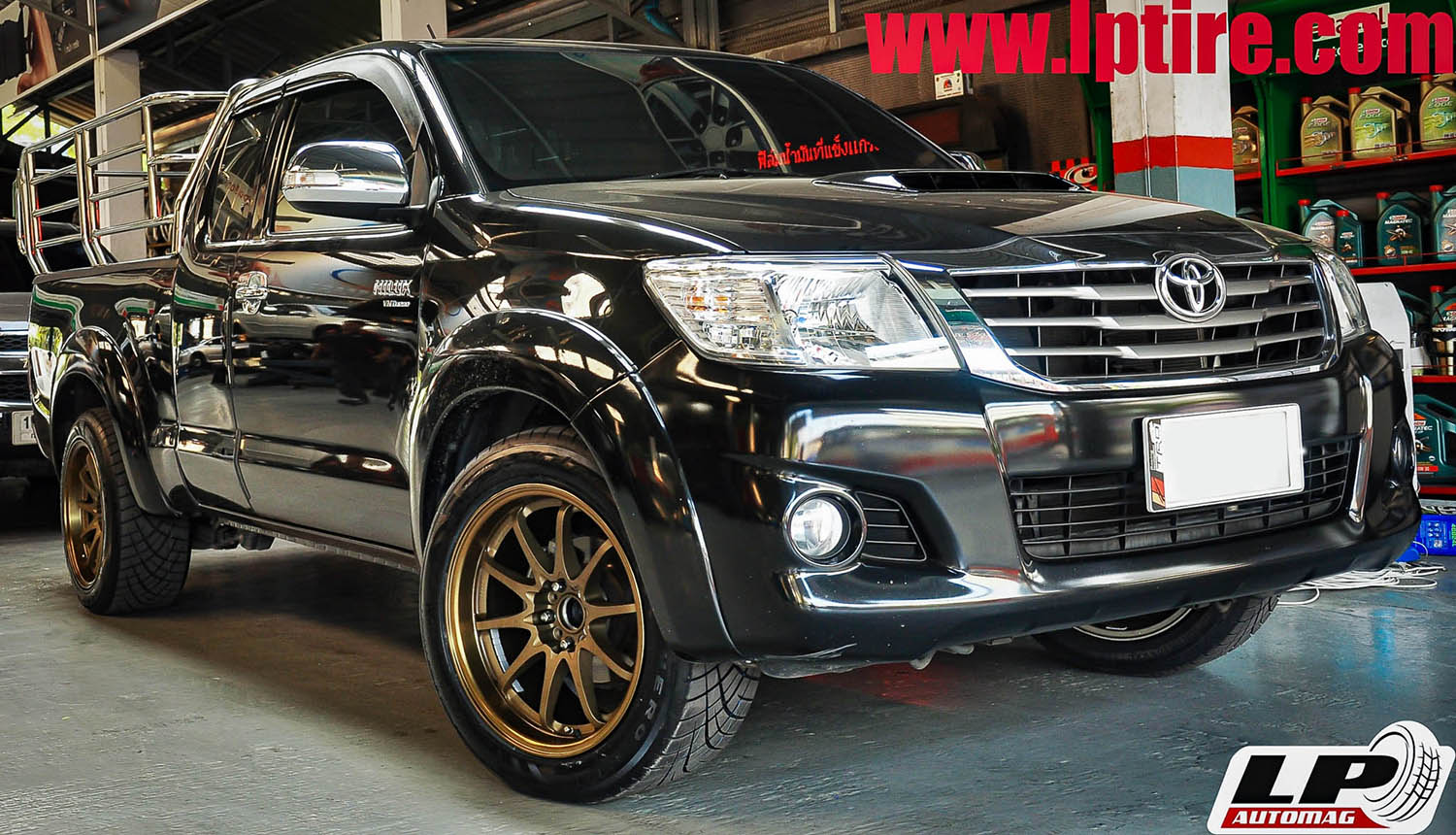 TOYOTA VIGO + แม็กลาย CE28 หน้า9หลัง10 18นิ้ว สีทองแดงยิงทราย + ยาง G2 TIRE RAIDEN HERO R111 หน้า 245/50-18 หลัง 275/45-18